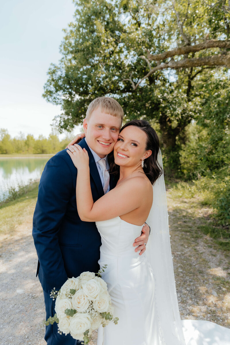 Michigan wedding photographer capturing timeless outdoor portraits for couples who want romantic, joyful, and story-driven wedding photos.