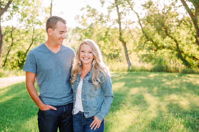 Couple smiling with joy in trees