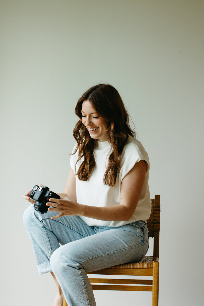 Marie-Catherine looking at photos on a camera