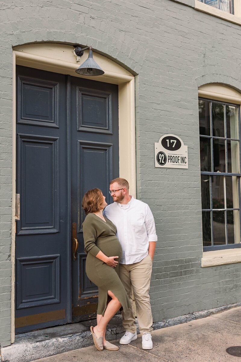 Timeless maternity photography in Staunton, VA, with expecting parents in a serene outdoor location