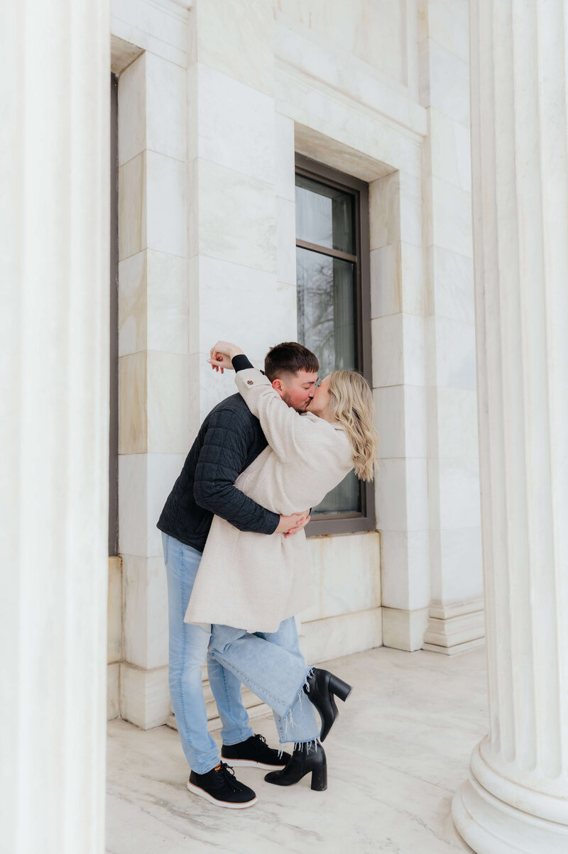 Romantic winter engagement photo in Cleveland, Ohio captured by a professional Michigan and Ohio couples photographer specializing in candid, natural light moments for laid-back love stories.