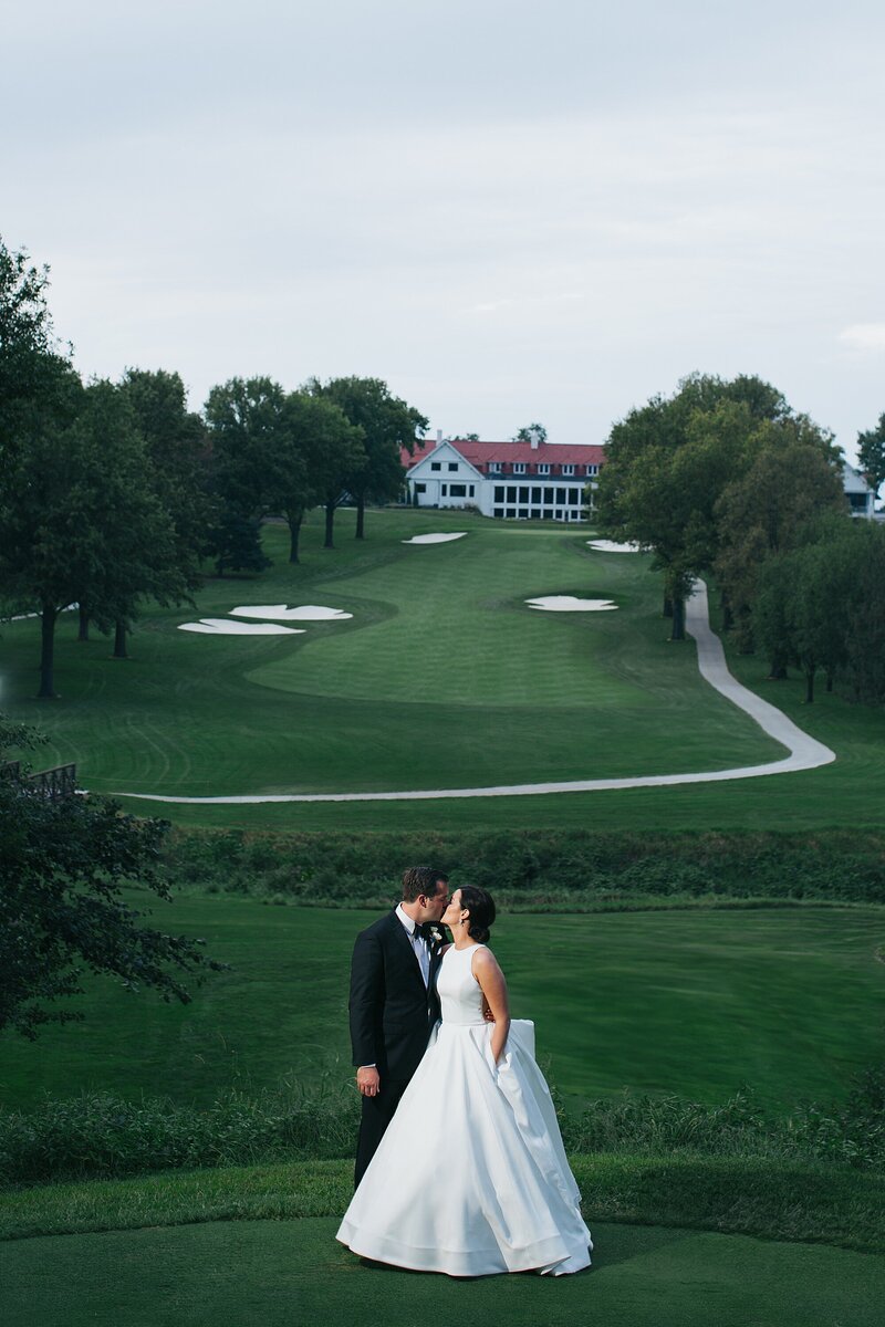 Happy Hollow Wedding. Classic and editorial wedding photography at Creighton Campus, St. John's Church, Happy Hollow Club and Joslyn Art Museum in Omaha, Nebraska. Luxury wedding photographer serving Lincoln, Aspen, Vail, Colorado, Chicago and Kansas City. Midwest and destination Wedding Photographers