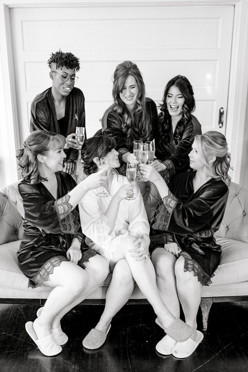Tiffany Longeway Photography captures a joyful and intimate moment of the bridal party celebrating at MacArthur Place Hotel & Spa in Sonoma, California. The elegant setting and the happy expressions of the bridesmaids create a warm and charming atmosphere, ideal for couples seeking a luxurious and memorable venue for their wedding celebration.