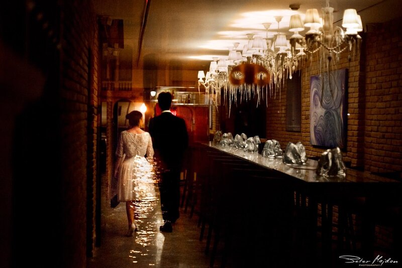 bride and groom walking outside