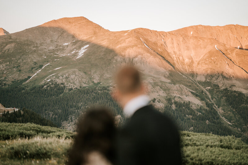 colorado elopement photography in aspen, bride and groom hiking at independence pass