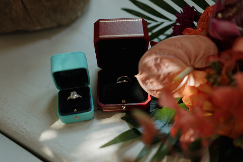 A stunning wedding jewelry shot, featuring vibrant gemstone reflections and gold details, elevating the essence of a high-end luxury mexico wedding
