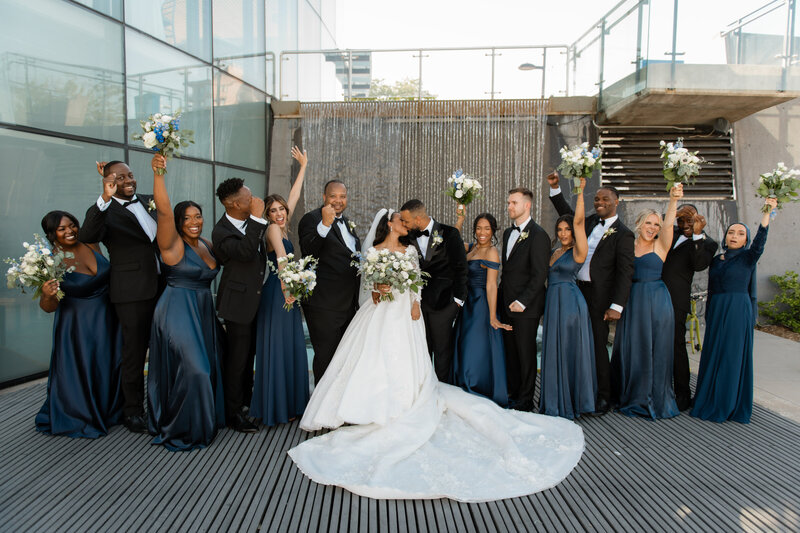 Couple posing on wedding day at Elora Mill