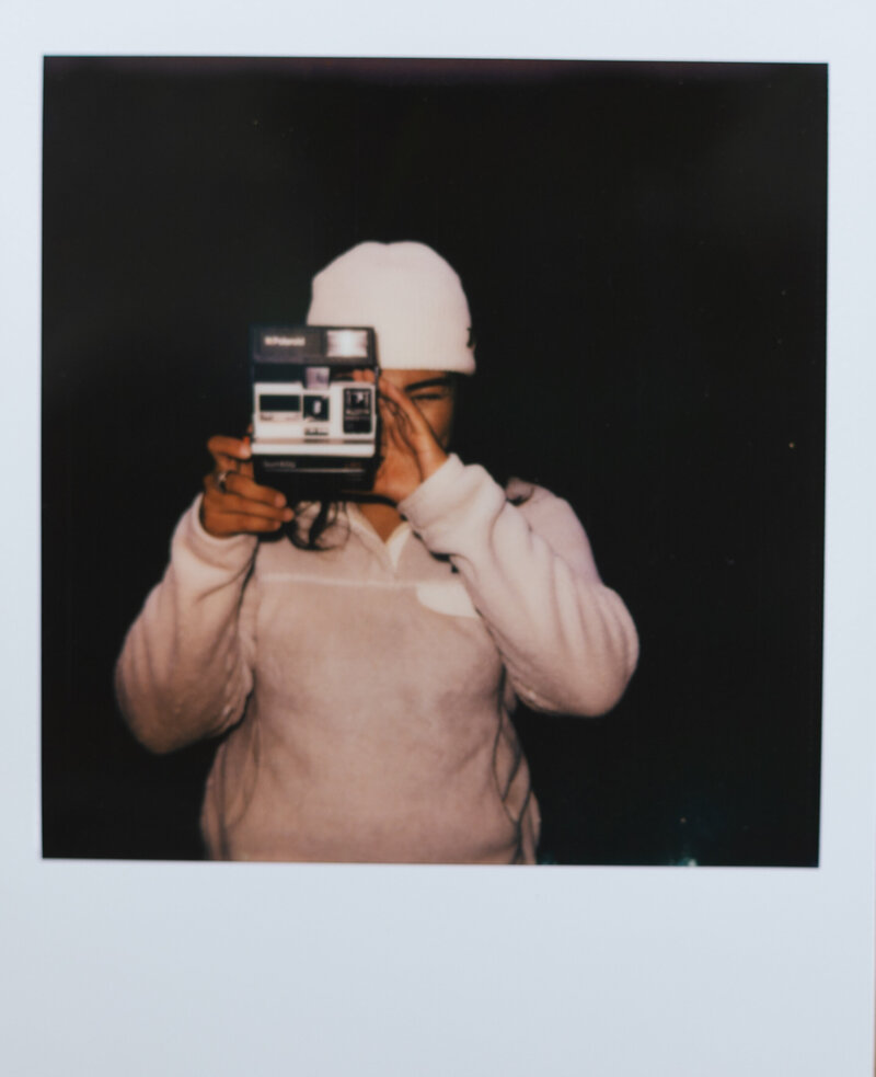 Colorado Elopement Photographer with her polaroid