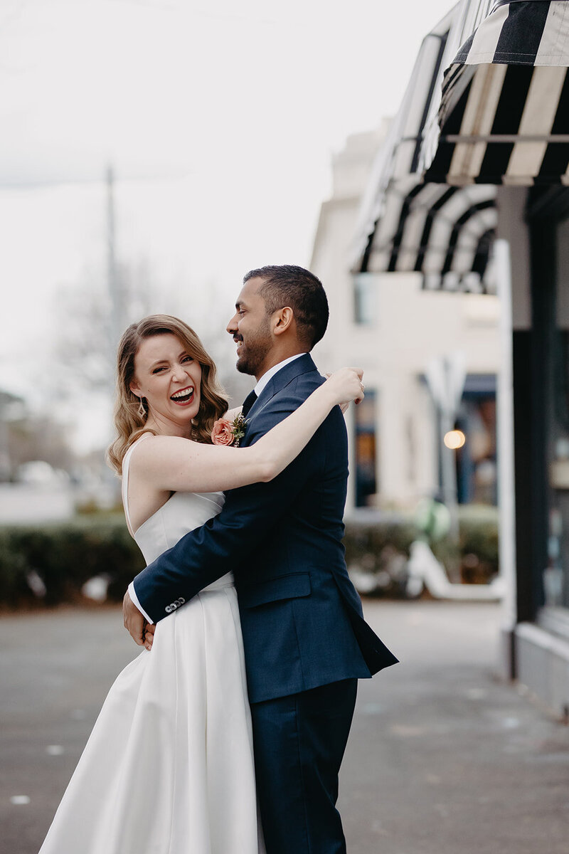 modern bride and groom walking through inner city streets of melbourne