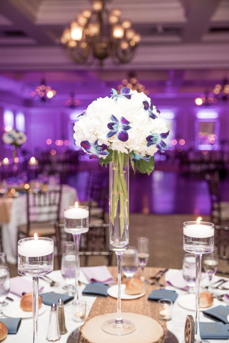 Elaborate centerpieces accented by purple backlighting