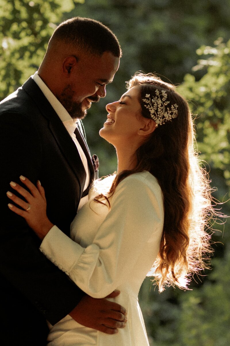 Beautiful backlight lighting for a candid wedding photo  captured by Hadi Photography