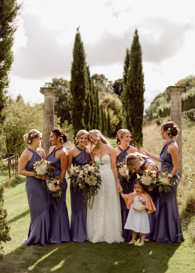 Bridesmaids in purple with bride