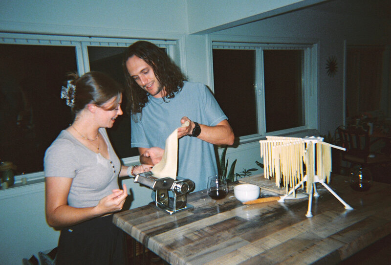an in home couples session making pasta