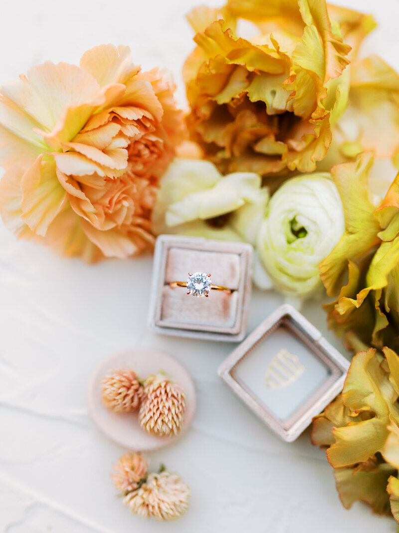 ring surrounded by flowers