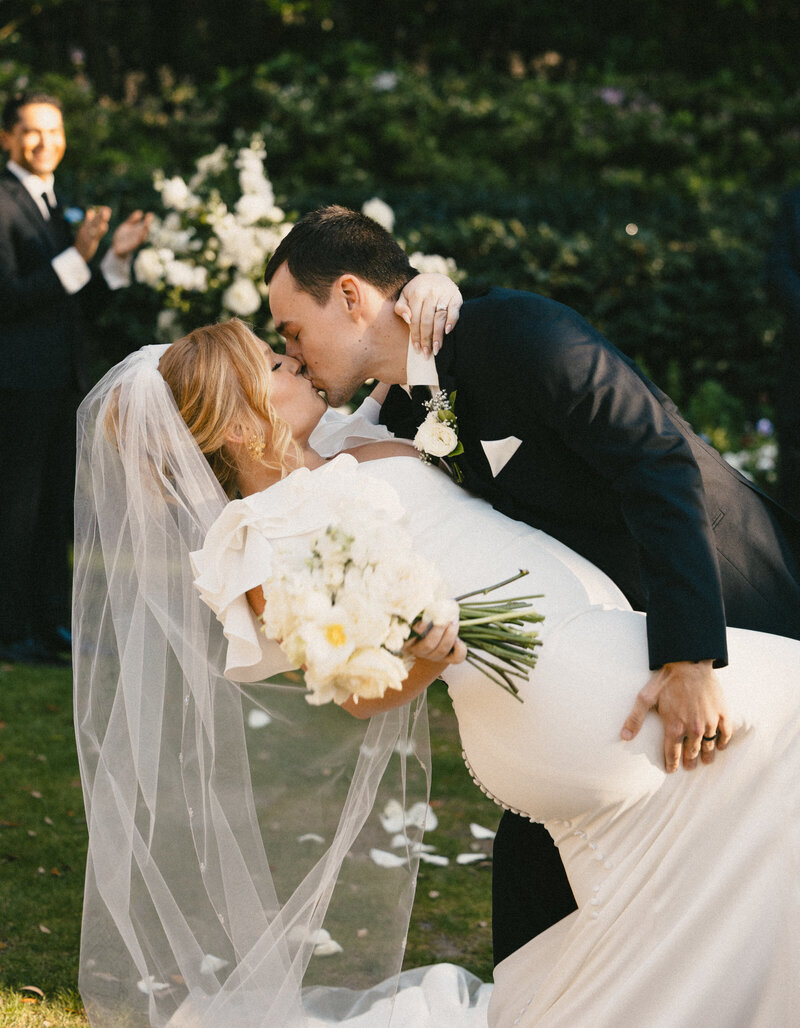 bride and groom embracing