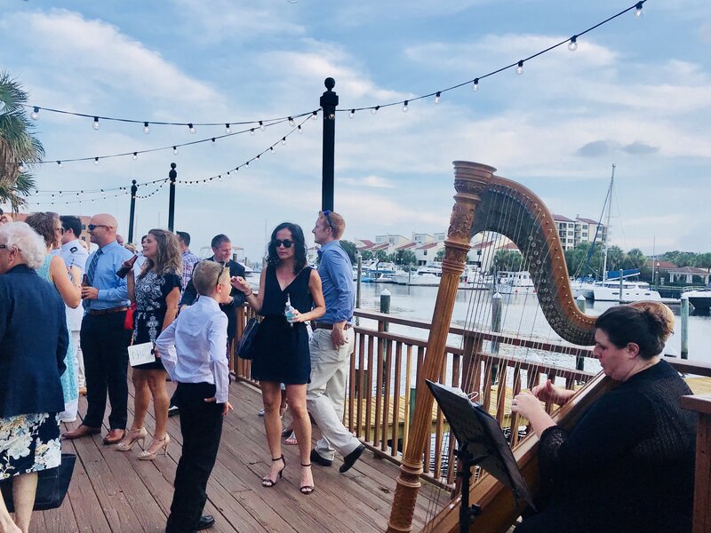 Harpist at Cocktail Hour at  the Venue Palafox Wharf Waterfront Pensacola, FL  Best Wedding Venue on Palafox