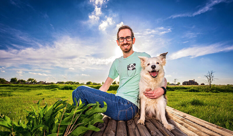 Border-Collie-Sits-With-Dog-Dad