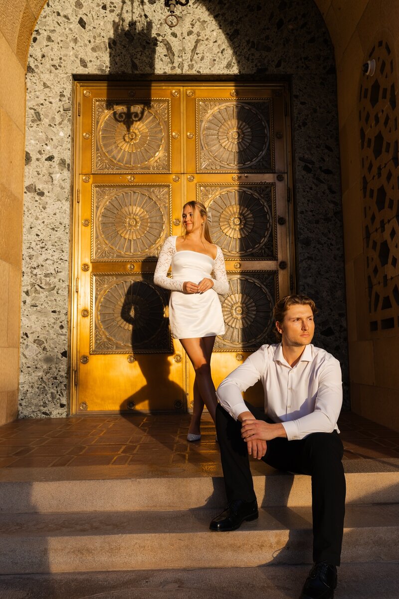 couple poses on doorsteps for couples shoot in mesa arizona