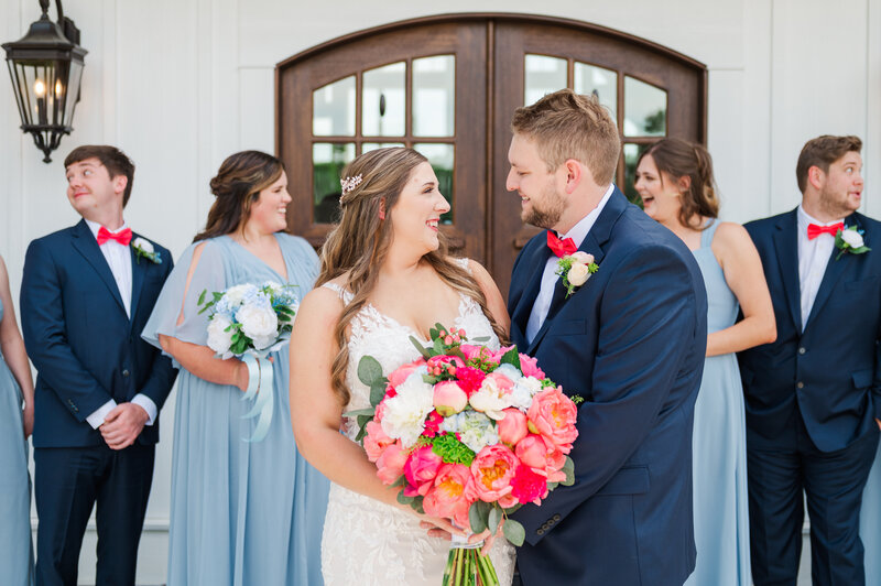 NC wedding couple walking down the beach