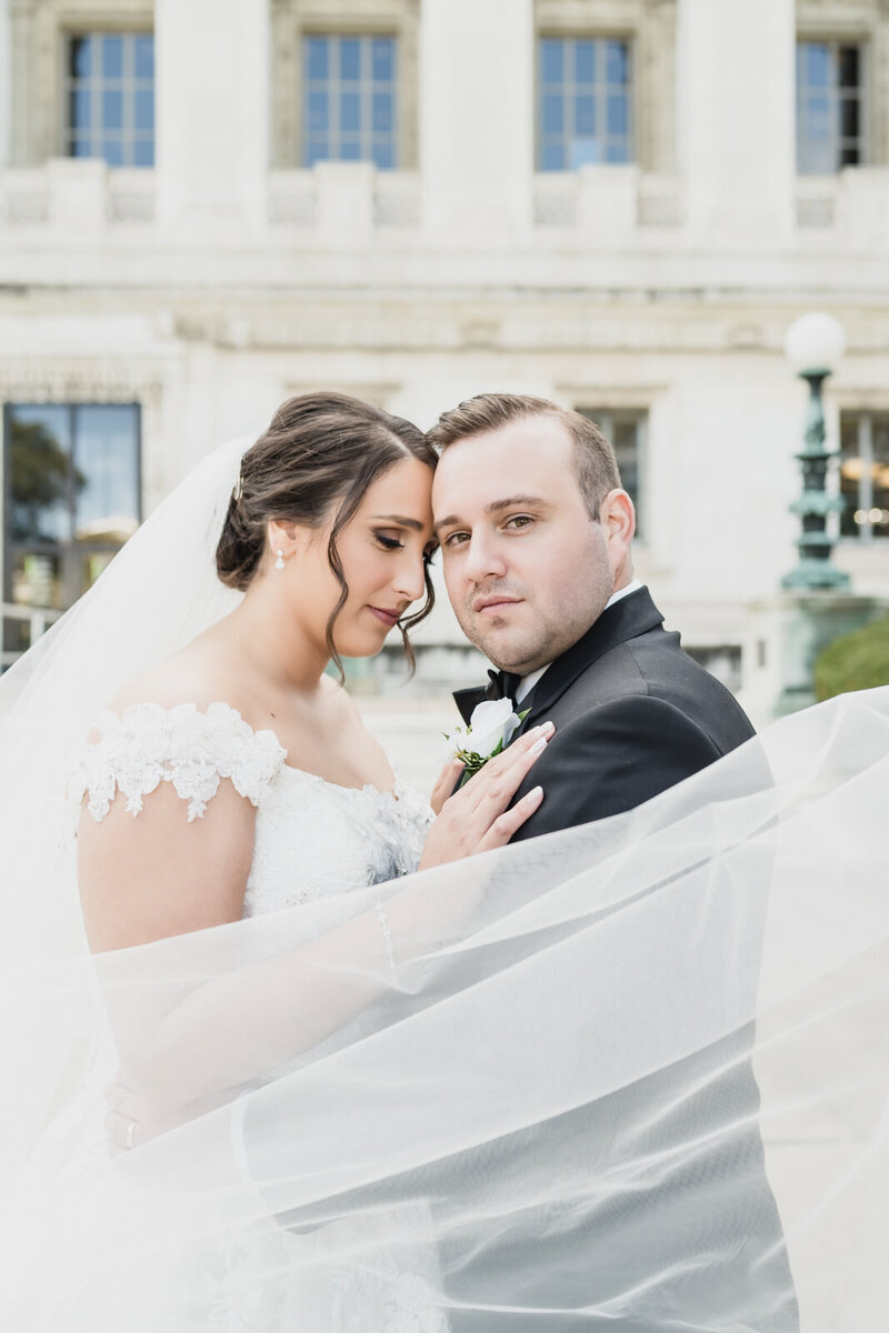 A classic Catholic wedding at Saint Peter and Paul Church in downtown Detroit followed by an elegant reception at Andiamo in Warren, Michigan. Timeless style, heartfelt moments, and refined details throughout.