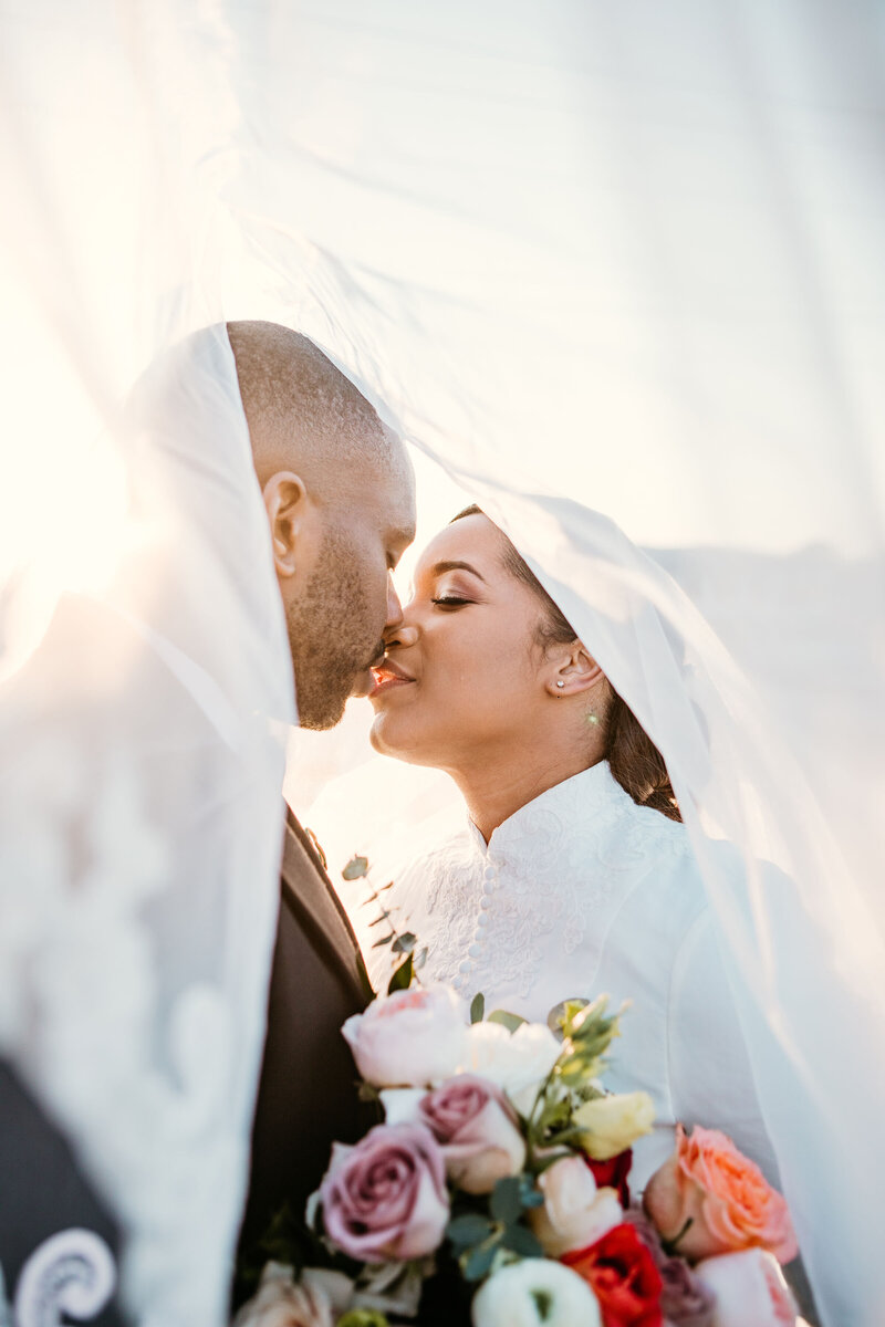 Bride and groom during golden hour on their wedding day.