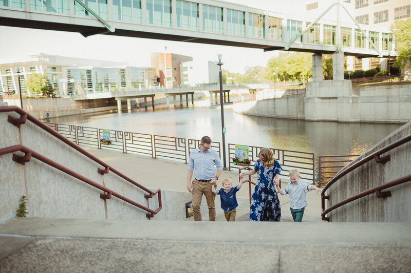 family walking up stairs