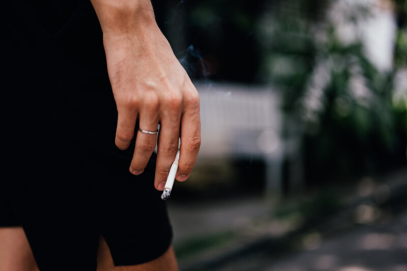 young-couple-man-woman-smoking-cigarette-together