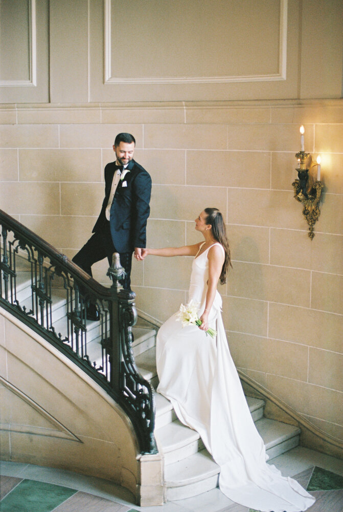 couple walking up stairs