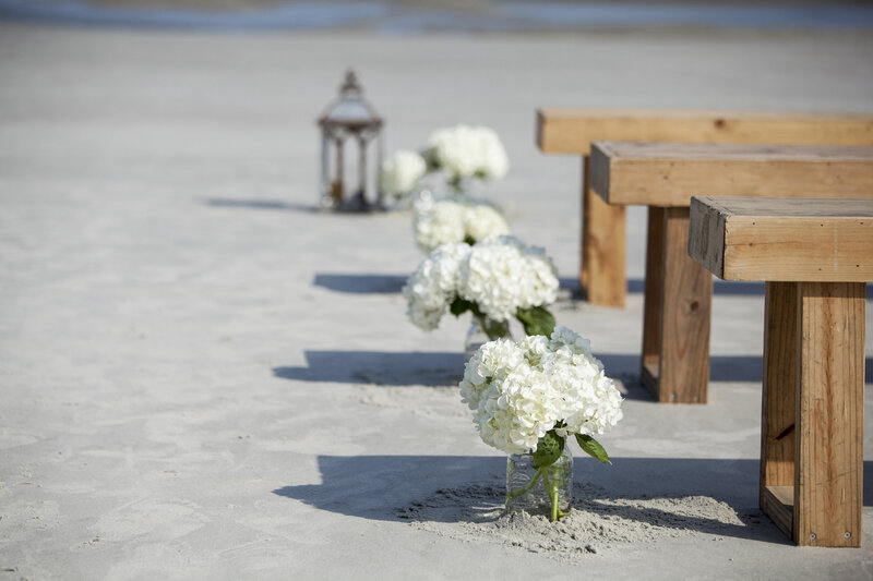 Simplicity Beach mason jars and flowers at wedding