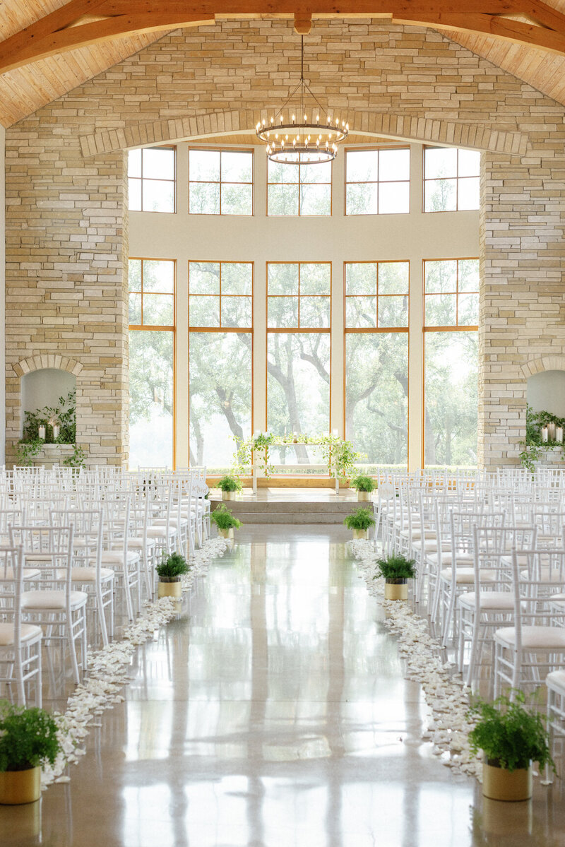 Indoor chapel ceremony at Canyonwood Ridge with modern architecture and soft light