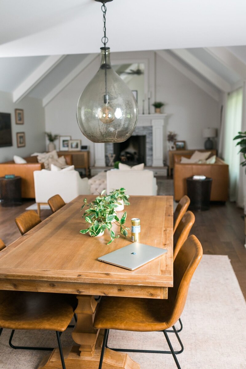 Elegant dining table image representing the personalized and detail-oriented approach Lauryn DeNenno employs in her family concierge real estate services.