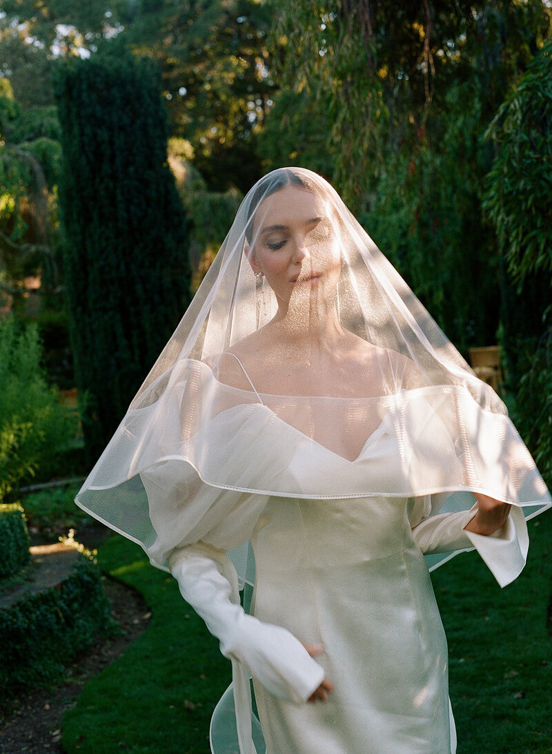 Bride in her third reception dress at Filoli Gardens wedding in California