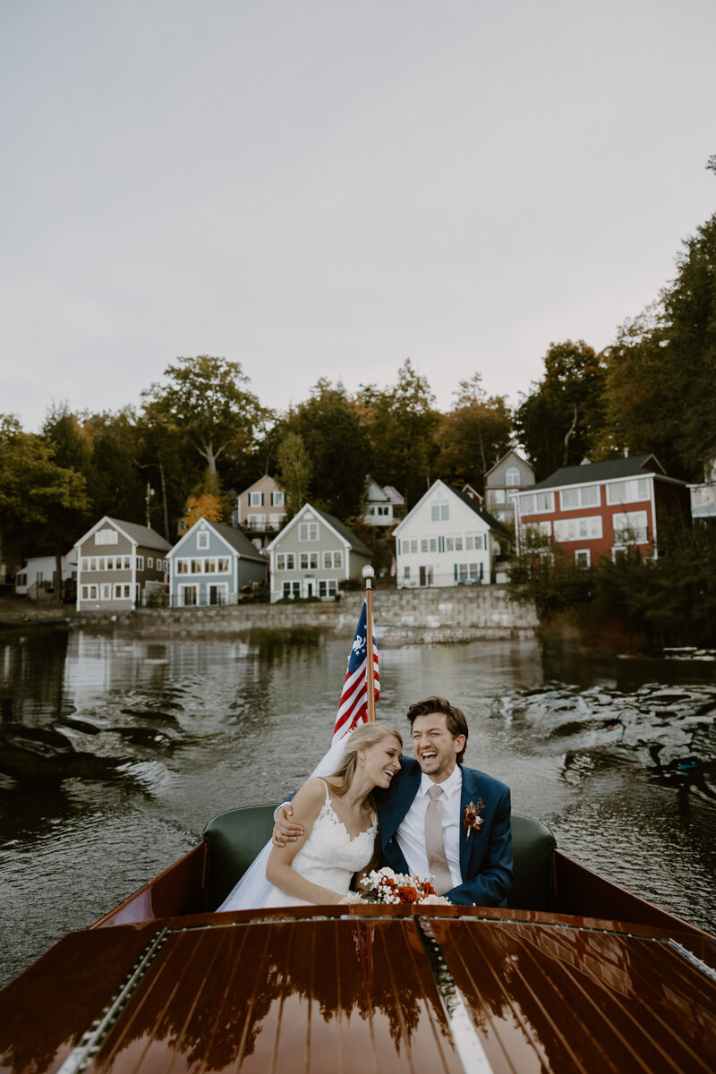 couple on getaway boat on lake winnipesaukee
