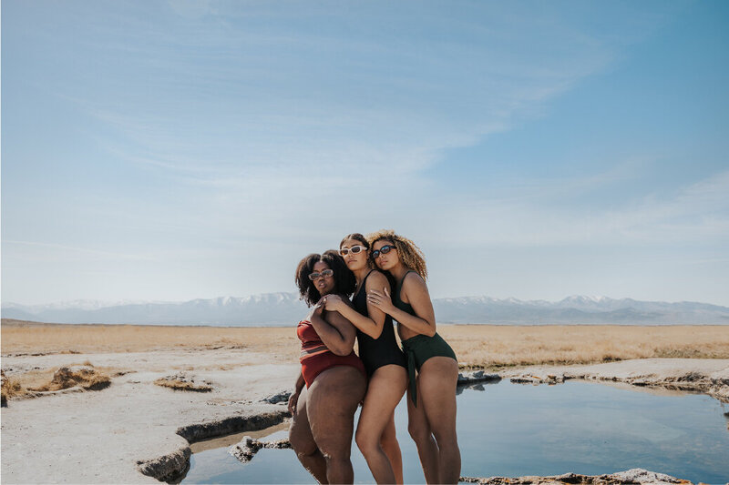 women in bathing suits at hot spring