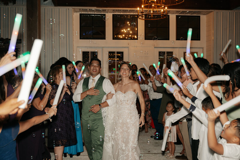 Grand exit for bride and groom at their Charleston SC wedding 