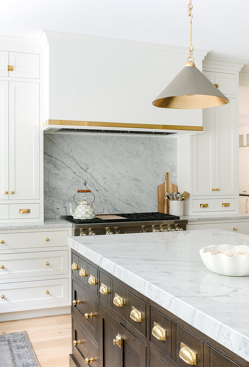 bright white kitchen cabinets with dark wood island