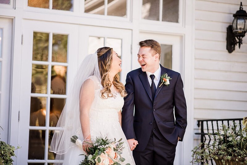 looking at each other and laughing by knoxville wedding photographer, amanda may photos