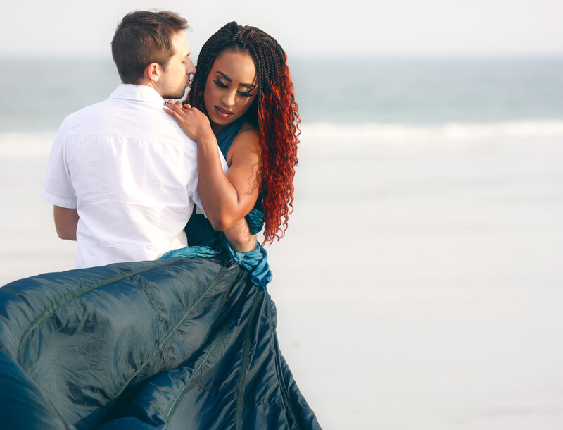 Savannah Georgia Boudoir and Glamour couple with woman in blue parachute gown on beach sexy and glamourous