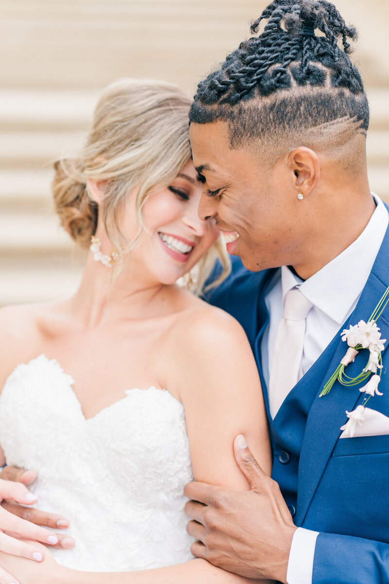 Beautiful bride and groom nuzzling into each other and smiling. Captured by los angeles wedding photographer Rachel Paige Photography
