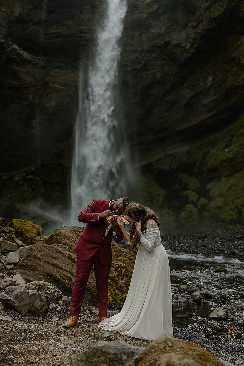 Reynisfjara Black Sand Beach Elopement with bride and groom on basalt columns.