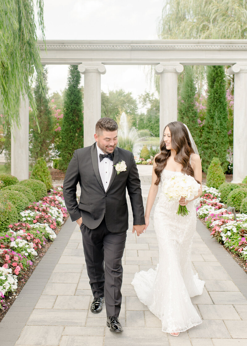 wedding couple walking away from ceremony after first kiss at their florida wedding.