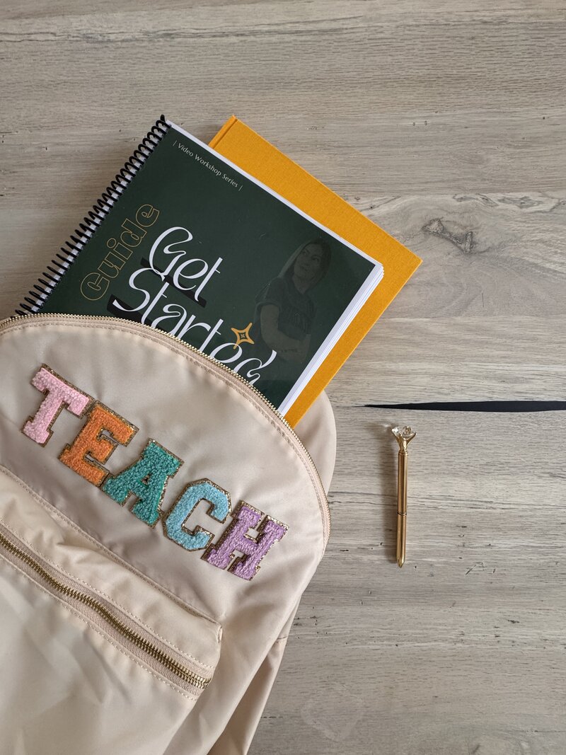a book bag with the word Teach on it and an EGP Get Started book sliding out