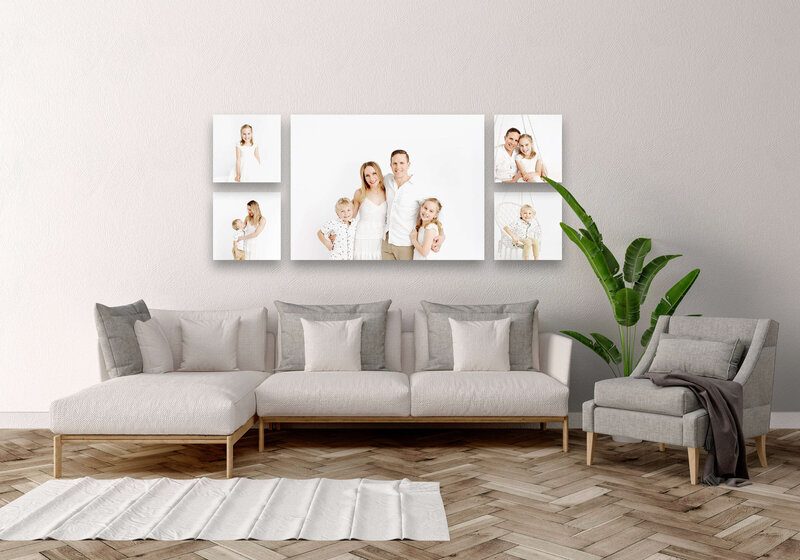 Image of a lounge room with family photograph canvas prints on the wall By Hobart  family and newborn photographer Lauren Vanier