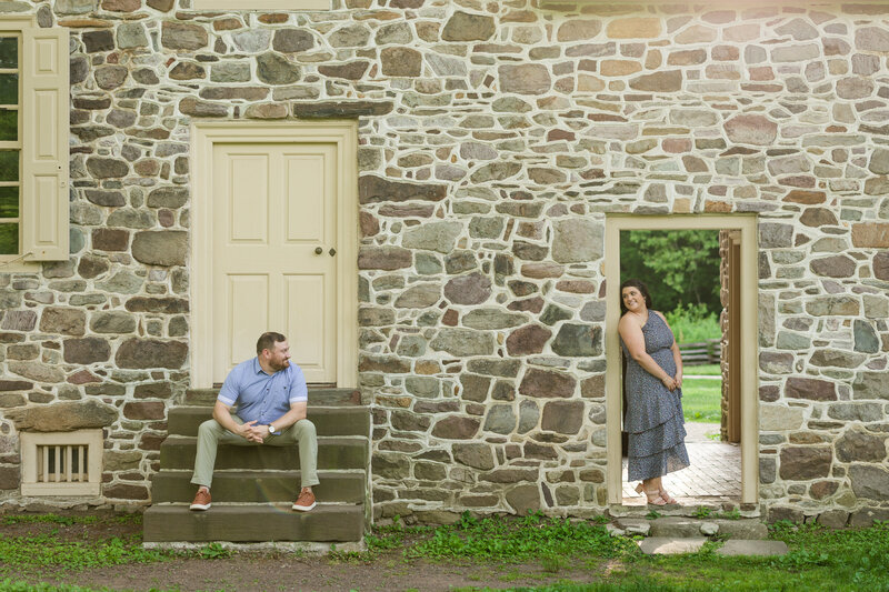 Couple sitting together near Washington’s Headquarters at Valley Forge National Historical Park, highlighting its historical beauty.