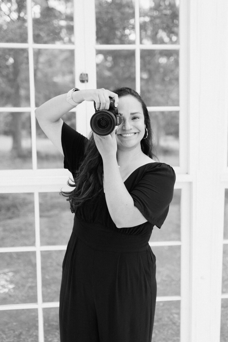 photographer holding the camera