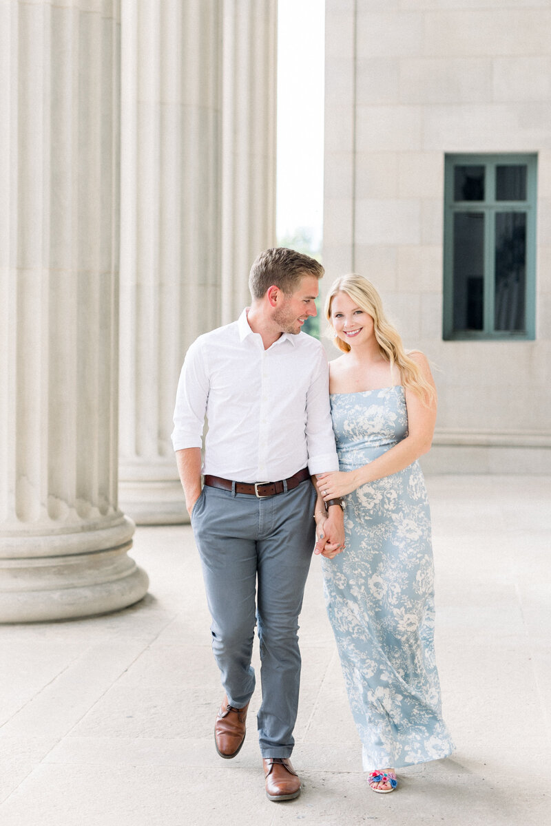 Bride and groom walk up memorial steps at their DC wedding