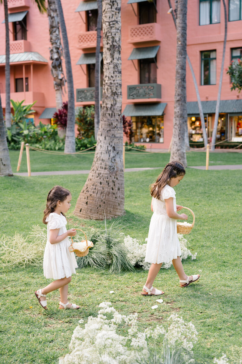 Wedding and Elopement Photography, flower girls walking through the grass