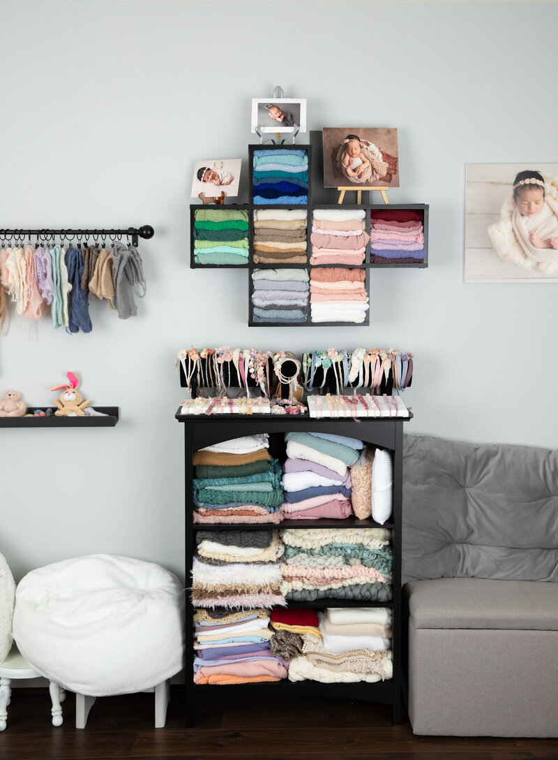 shelving with colorful newborn wraps