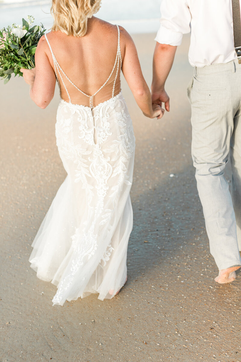 brides dress on beach in st. augustine florida