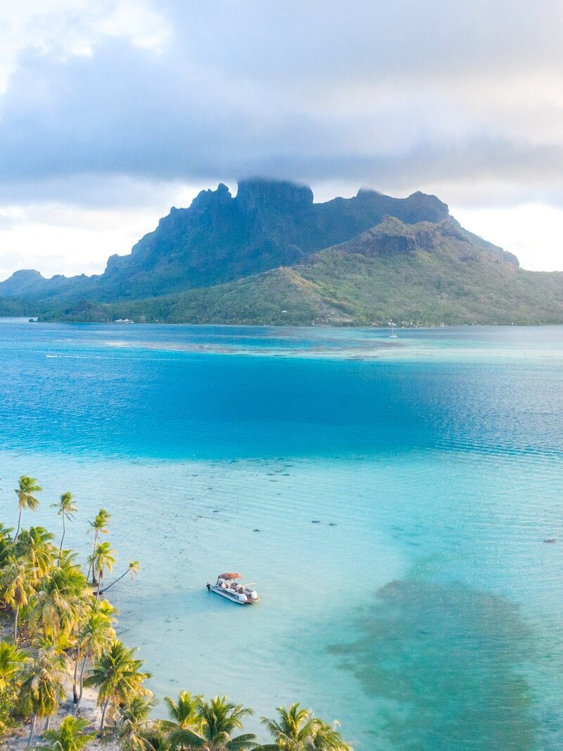 Aerial View of the boat trip in Bora Bora lagoon with an amazing view